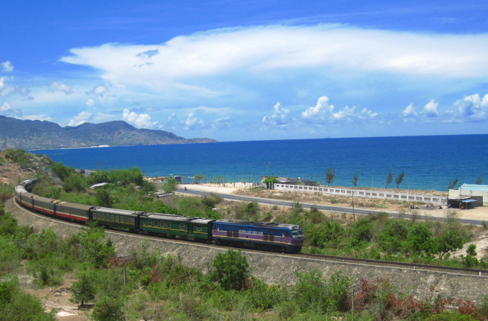 Ho Chi Minh City to Nha Trang route offers views of Vietnam’s southern coastline, with glimpses of palm-lined beaches, rural villages, and sunrise over the sea